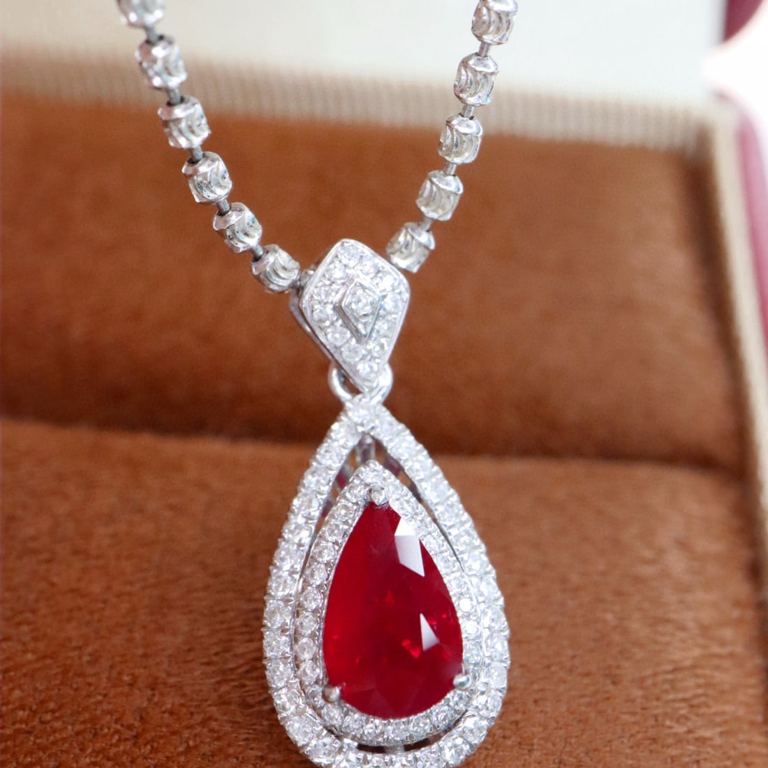 14k Gold 1.47 Ctw Natural Ruby & Diamond Pendant( Without Chain ): Ref:230994298 // gold content:14k gold // main gemstone:ruby // shape:pear // carat weight:1. 19ct // color:pigeonblood red // treatment:natural // // adjacent gemstone 2 : diamond // shape:round // c