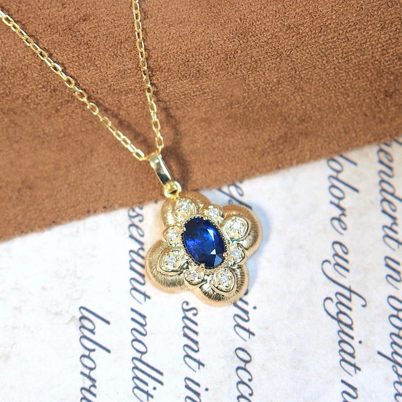 14k Gold 0.6 Ct Natural Sapphire & Diamond Necklace: Ref:230994310 // gold content:14k gold // main gemstone:sapphire // shape:oval // carat weight:0. 6ct // color:royal blue // treatment:natural // // adjacent gemstone 2 : diamond // shape:round //