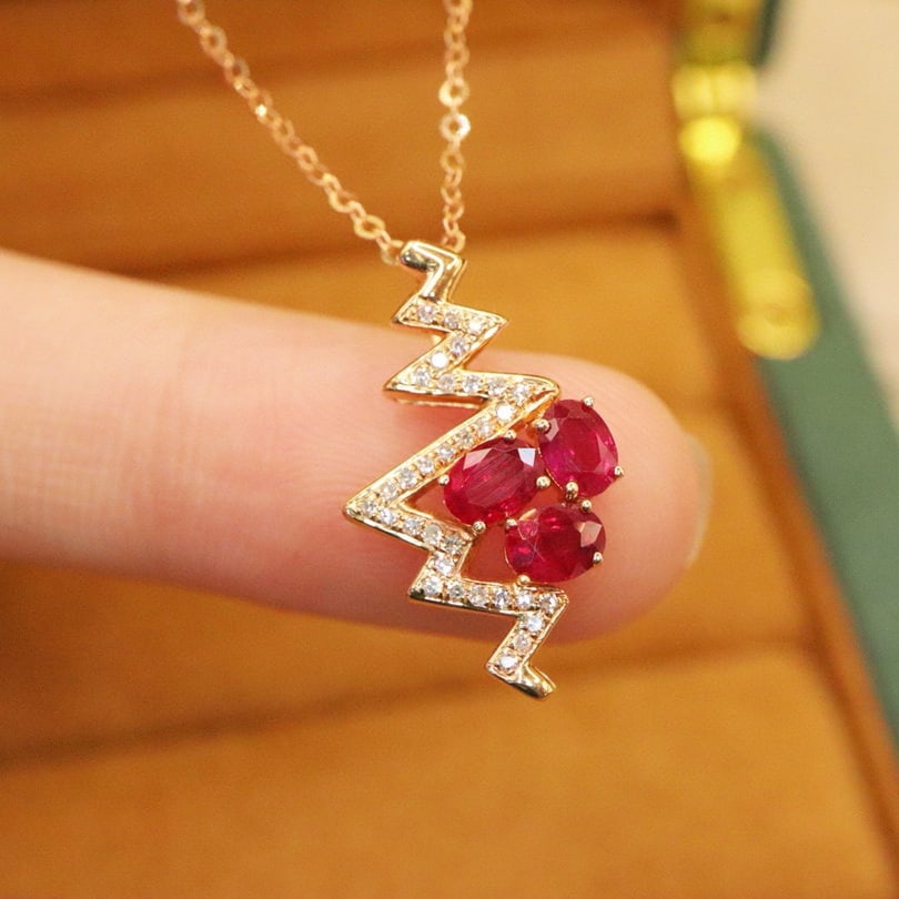 14k Gold 1.02 Ctw Natural Ruby & Diamond Pendant( Without Chain ): Ref:230994334 // gold content:14k gold // main gemstone:ruby // shape:oval // carat weight:0. 93ct // color:red // treatment:natural // // adjacent gemstone 2 : diamond // number of stones:32 //