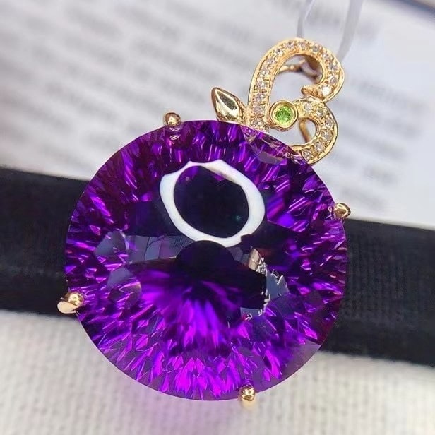 14k Gold 23.6 Ct Natural Amethyst & Diamond Pendant( Without Chain ): Ref:230994337 // gold content:14k gold // main gemstone:amethyst // shape:round // carat weight:23. 6ct // color:purple // treatment:natural // cut grade:g // // adjacent gemstone 2 : diamond //