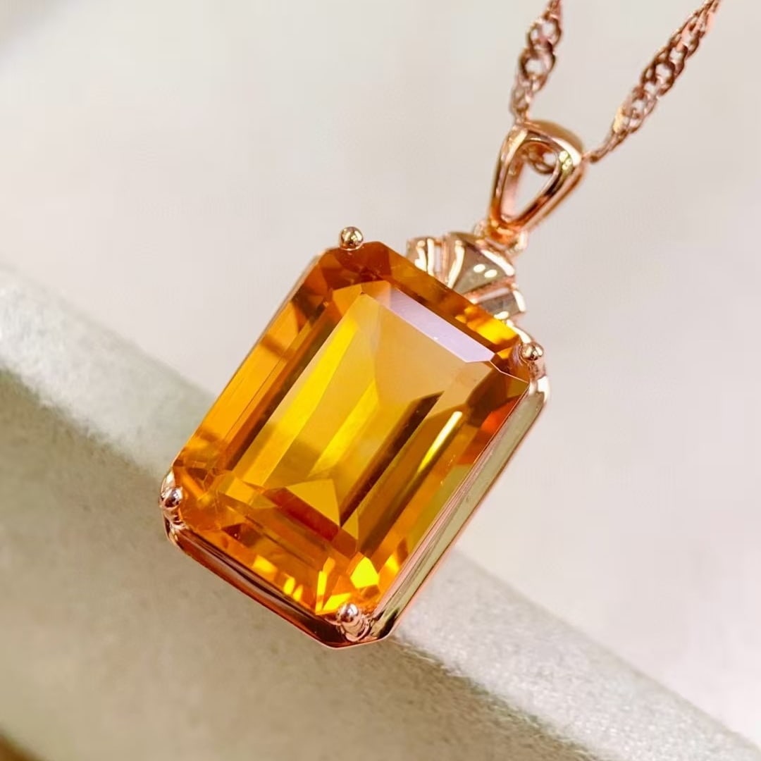 14k Gold 7.15 Ct Natural Citrine Pendant( Without Chain ): Ref:230994339 // gold content:14k gold // main gemstone:citrine // shape:octagonal // carat weight:7. 15ct // color:yellow // treatment:natural // Condition: New High Estimate: 2600 Low Estimate: 1800