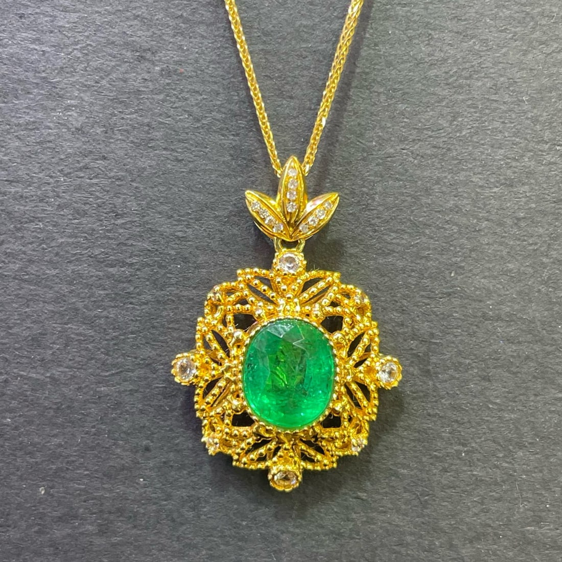 14k Gold 1.88 Ct Natural Emerald & Diamond & Sapphire Pendant( Without Chain ): Ref:230994347 // gold content:14k gold // main gemstone:emerald // shape:oval // carat weight:1. 88ct // color:green // treatment:natural // // adjacent gemstone 2 : diamond // number of stones:12 // 