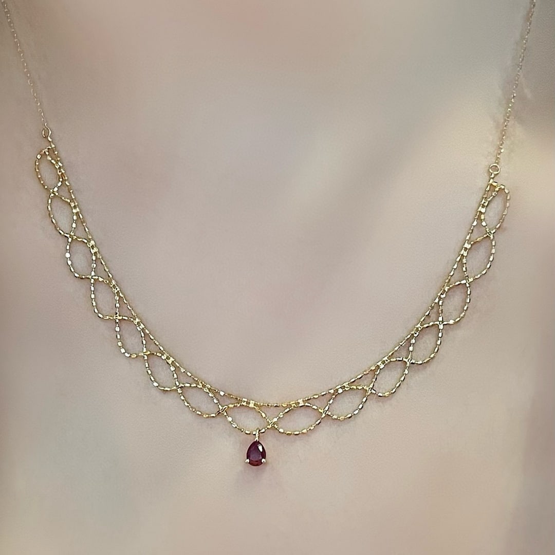 14k Gold 0.18 Ct Natural Ruby Necklace: Ref:230994394 // gold content:14k gold // main gemstone:ruby // shape:pear // carat weight:0. 18ct // color:red // treatment:natural // Low Estimate: 1500 Condition: New High Estimate: 2300
