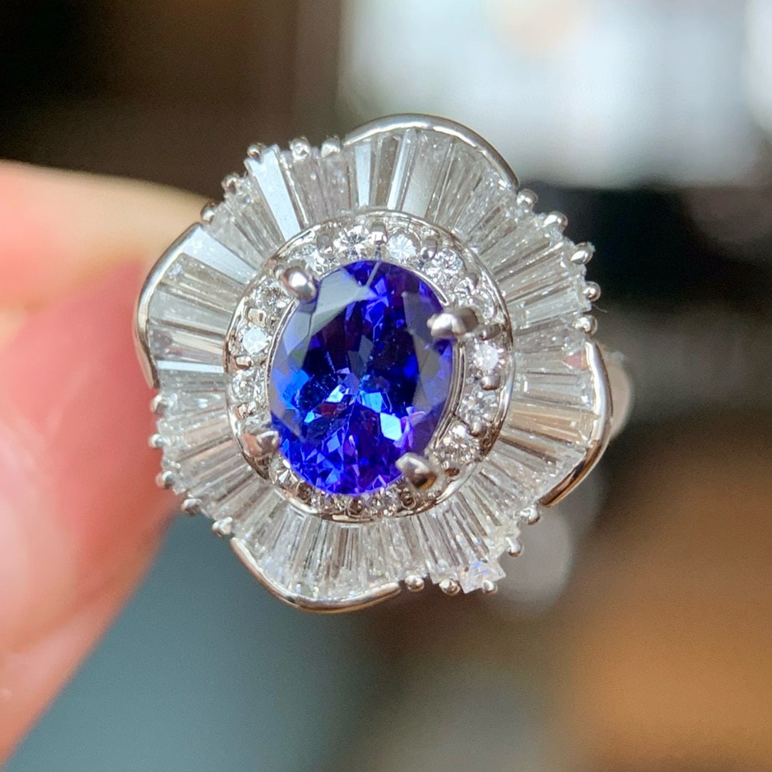 14k Gold 2.77 Ctw Natural Tanzanite & Diamond Ring: Ref:230994421 // gold content:14k gold // ring size:7. 25us // // main gemstone:tanzanite // shape:oval // carat weight:1. 43ct // color:blue // treatment:natural // // adjacent gemstone 2 : diamond