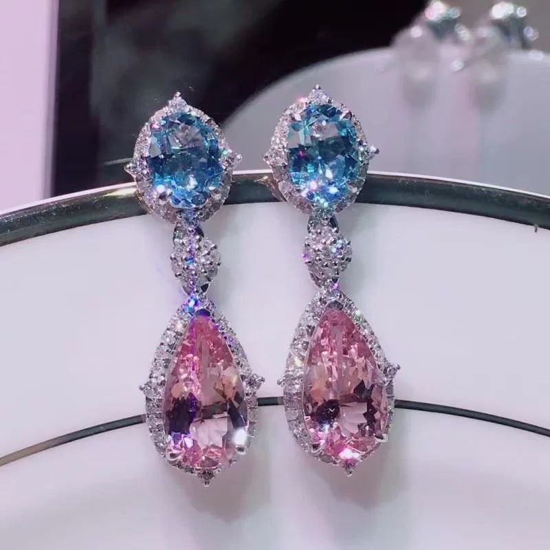14k Gold 5.60 Ct Natural Morganite & Aquamarine & Diamond Earrings: Ref:230995002 // gold content:14k gold // main gemstone:morganite // shape:pear // carat weight:5. 60ct // color:pink // treatment:natural // // adjacent gemstone 2 : aquamarine // shape:oval //