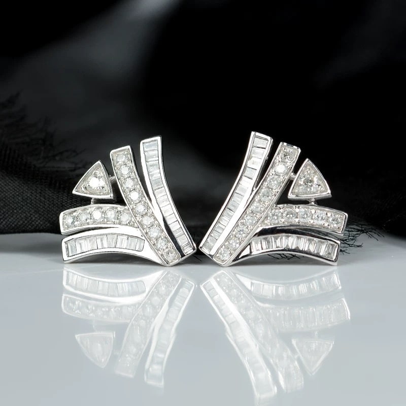 14k Gold 0.68 Ct Natural H Diamond Earrings: Ref:230995003 // gold content:14k gold // main gemstone:diamond // shape:multiply // carat weight:0. 68ct // clarity grade:vs-si // color:h // treatment:natural // Condition: New Low Estimate: