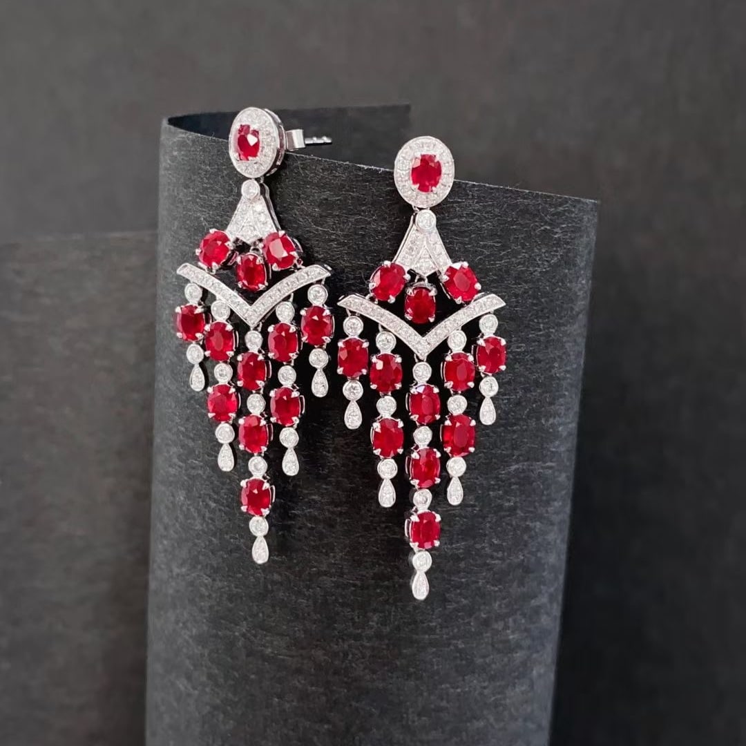 14k Gold 5.05 Ctw Natural Ruby & Diamond Earrings: Ref:230995006 // gold content:14k gold // main gemstone:ruby // shape:oval // carat weight:4. 35ct // color:red // treatment:natural // // adjacent gemstone 2 : diamond // shape:round // carat weight: