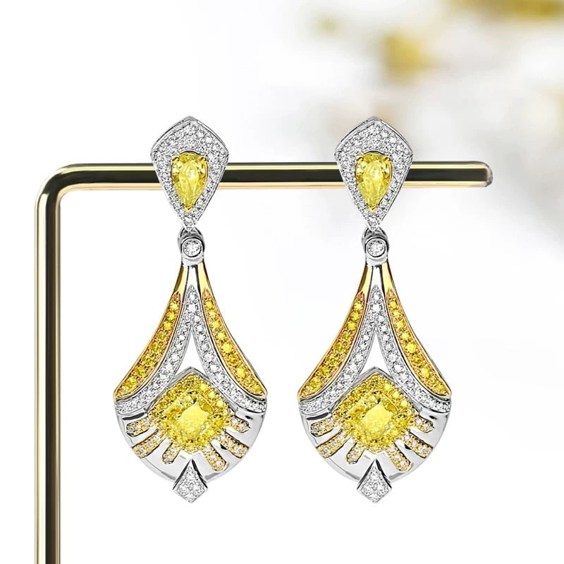 14k Gold 1.88 Ctw Natural Yellow Diamond & Diamond Earrings: Ref:230995011 // gold content:14k gold // main gemstone:yellow diamond // shape:cushion & pear // carat weight:1. 2ct // color:yellow // treatment:natural // // adjacent gemstone 2 : diamond & yellow