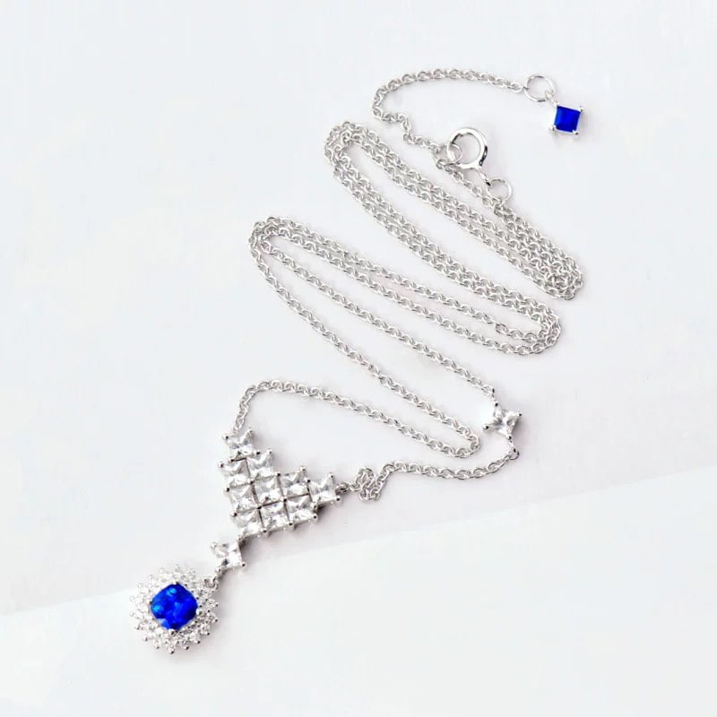 14k Gold 2.49 Ctw Natural Sapphire & Diamond Necklace: Ref:230995014 // gold content:14k gold // main gemstone:sapphire // shape:cushion // carat weight:0. 7ct // color:blue // treatment:natural // // adjacent gemstone 2 : sapphire // shape:square //