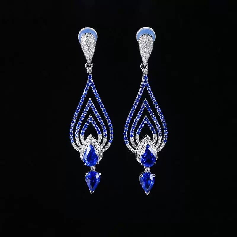14k Gold 2.63 Ctw Natural Sapphire & Diamond Earrings: Ref:230995015 // gold content:14k gold // main gemstone:sapphire // shape:pear // carat weight:2. 23ct // color:blue // treatment:natural // // adjacent gemstone 2 : diamond // number of stones:124 //