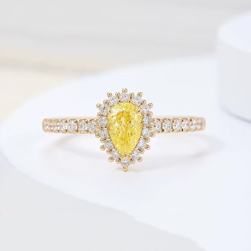 14k Gold 0.67 Ctw Natural Yellow Diamond & Diamond Ring: Ref:230995024 // gold content:14k gold // ring size:7. 25us // // main gemstone:yellow diamond // shape:pear // carat weight:0. 38ct // color:yellow // treatment:natural // // adjacent gemstone 2 : di