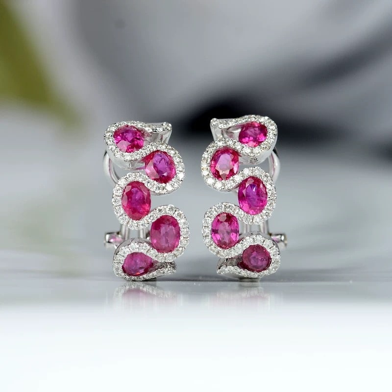 14k Gold 1.66 Ctw Natural Ruby & Diamond Earrings: Ref:230995029 // gold content:14k gold // main gemstone:ruby // shape:oval // carat weight:1. 28ct // color:red // treatment:natural // // adjacent gemstone 2 : diamond // shape:round // carat weight: