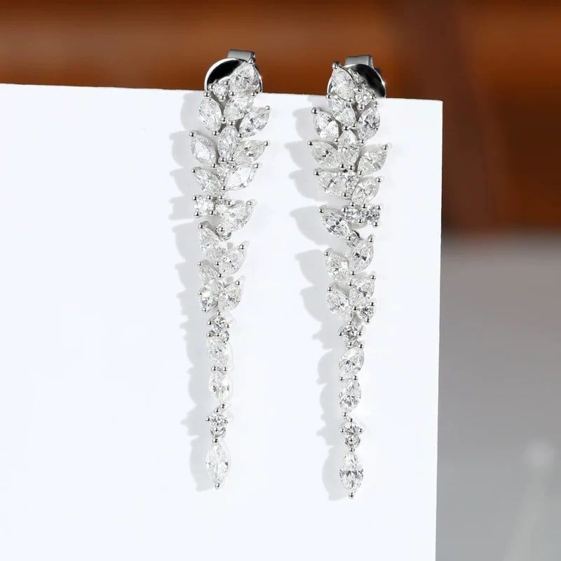 14k Gold 1.32 Ct Natural H Diamond Earrings: Ref:230995043 // gold content:14k gold // main gemstone:diamond // shape:marquise // carat weight:1. 32ct // clarity grade:vs-si // color:h // treatment:natural // Condition: New Low Estimate: 6600 Hi