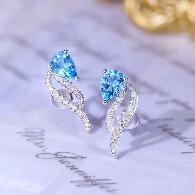 14k Gold 1.33 Ctw Natural Aquamarine & Diamond Earrings: Ref:230995051 // gold content:14k gold // main gemstone:aquamarine // shape:pear // carat weight:1. 11ct // color:blue // treatment:natural // // adjacent gemstone 2 : diamond // shape:round // carat