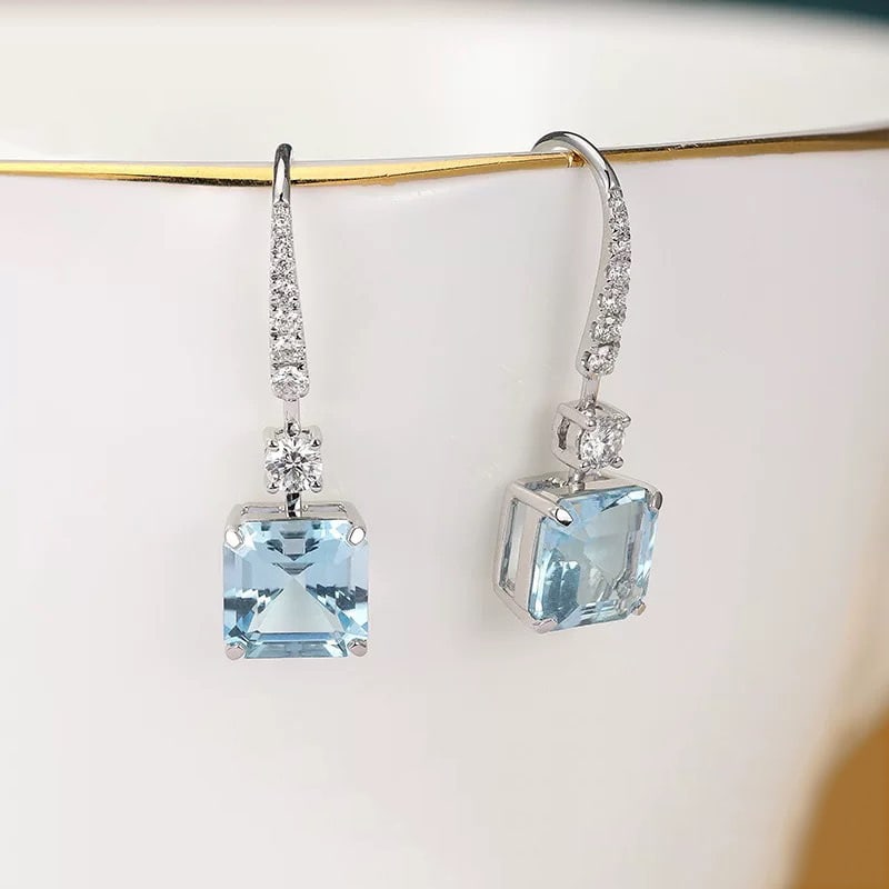 14k Gold 3.21 Ctw Natural Aquamarine & Diamond Earrings: Ref:230995057 // gold content:14k gold // main gemstone:aquamarine // shape:asscher // carat weight:2. 92ct // color:blue // treatment:natural // // adjacent gemstone 2 : diamond // shape:round //