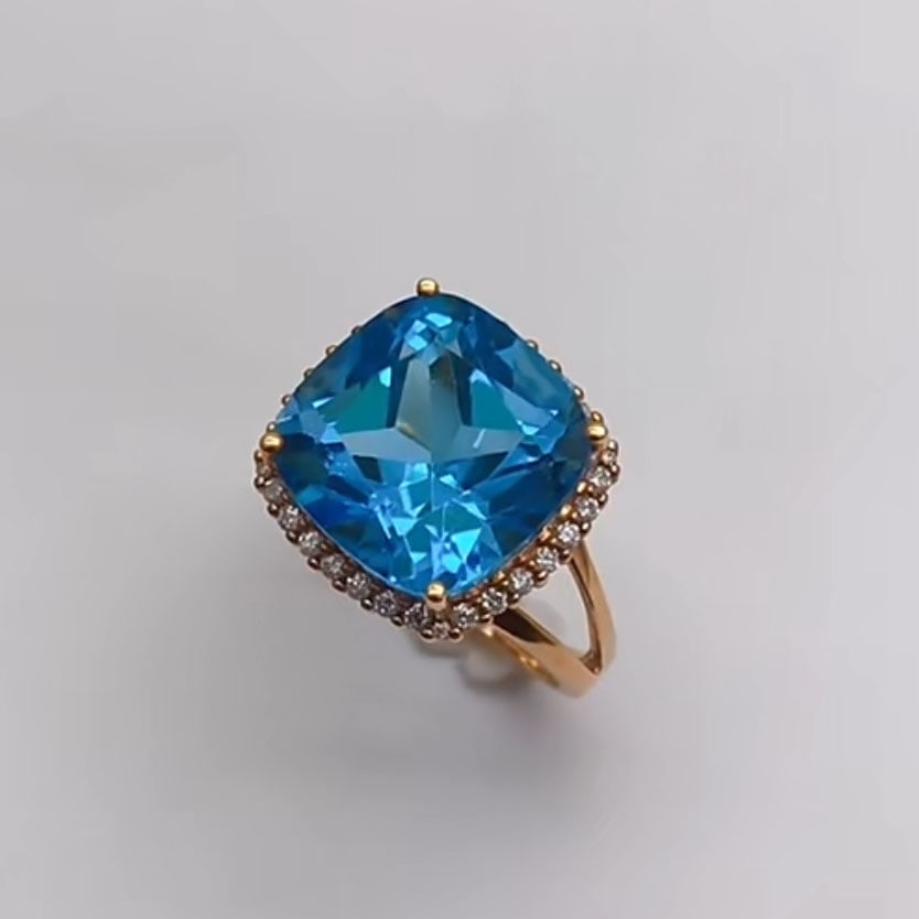 14k Gold 12.29 Ctw Natural Topaz & Diamond Ring: Ref:230995065 // gold content:14k gold // ring size:7. 25us // // main gemstone:topaz // shape:cushion // carat weight:12ct // color:blue // treatment:natural // // adjacent gemstone 2 : diamond // nu