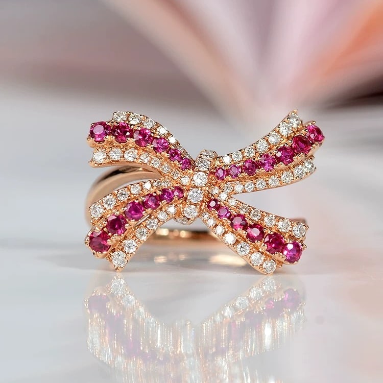 14k Gold 0.84 Ctw Natural Ruby & Diamond Ring: Ref:230995066 // gold content:14k gold // ring size:7. 25us // // main gemstone:ruby // shape:round // carat weight:0. 52ct // color:red // treatment:natural // cut grade:g // // adjacent gemstone 2