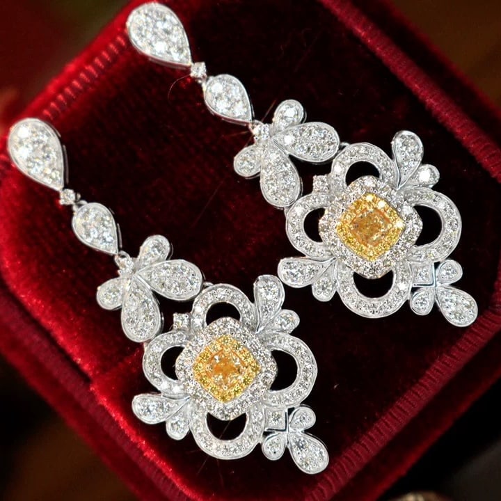 14k Gold 2 Ct Natural Yellow Diamond & Diamond Earrings: Ref:230995076 // gold content:14k gold // main gemstone:yellow diamond & diamond // shape:cushion & round // carat weight:2ct // color:yellow & h // treatment:natural // Condition: New Low Estimate: