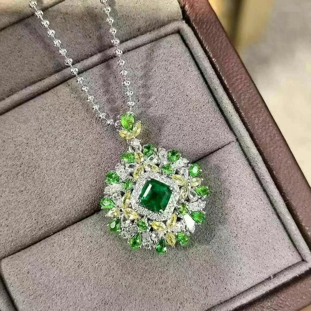 14k Gold 1.27 Ctw Natural Emerald & Diamond Pendant( Without Chain ): Ref:230995078 // gold content:14k gold // main gemstone:emerald // shape:octagonal // carat weight:0. 95ct // color:green // treatment:natural // // adjacent gemstone 2 : diamond // shape:multiply //