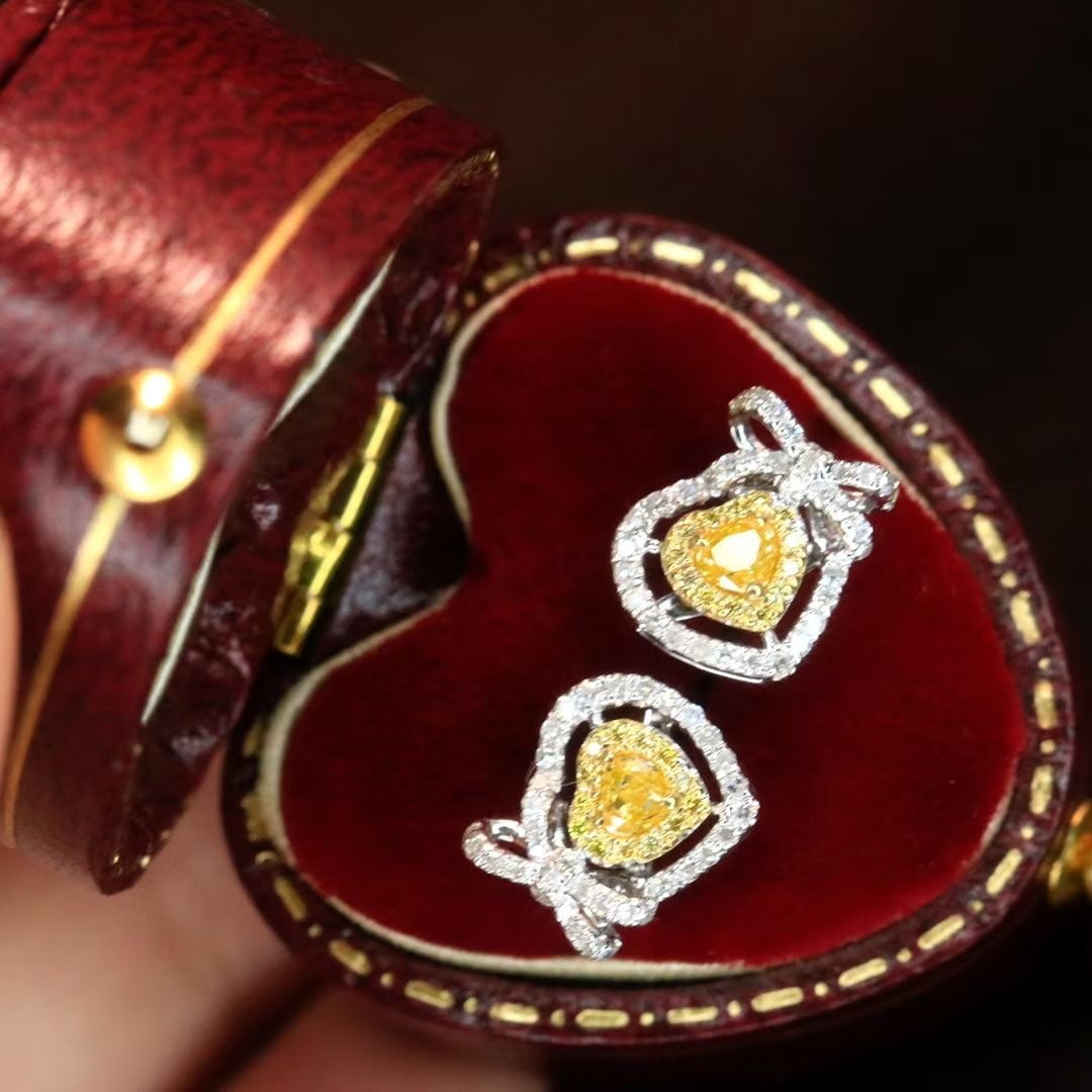 14k Gold 0.52 Ct Natural Yellow Diamond & Diamond Earrings: Ref:230995080 // gold content:14k gold // main gemstone:yellow diamond & diamond // shape:heart & round // carat weight:0. 52ct // color:yellow & h // treatment:natural // Condition: New Low