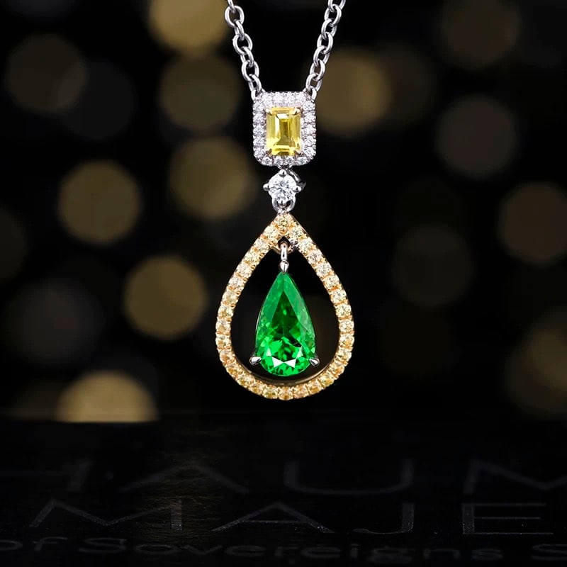 14k Gold 1.71 Ctw Natural Tsavorite & Sapphire Pendant( Without Chain ): Ref:230995084 // gold content:14k gold // main gemstone:tsavorite // shape:pear // carat weight:1. 24ct // color:green // treatment:natural // // adjacent gemstone 2 : sapphire // number of stones:31 