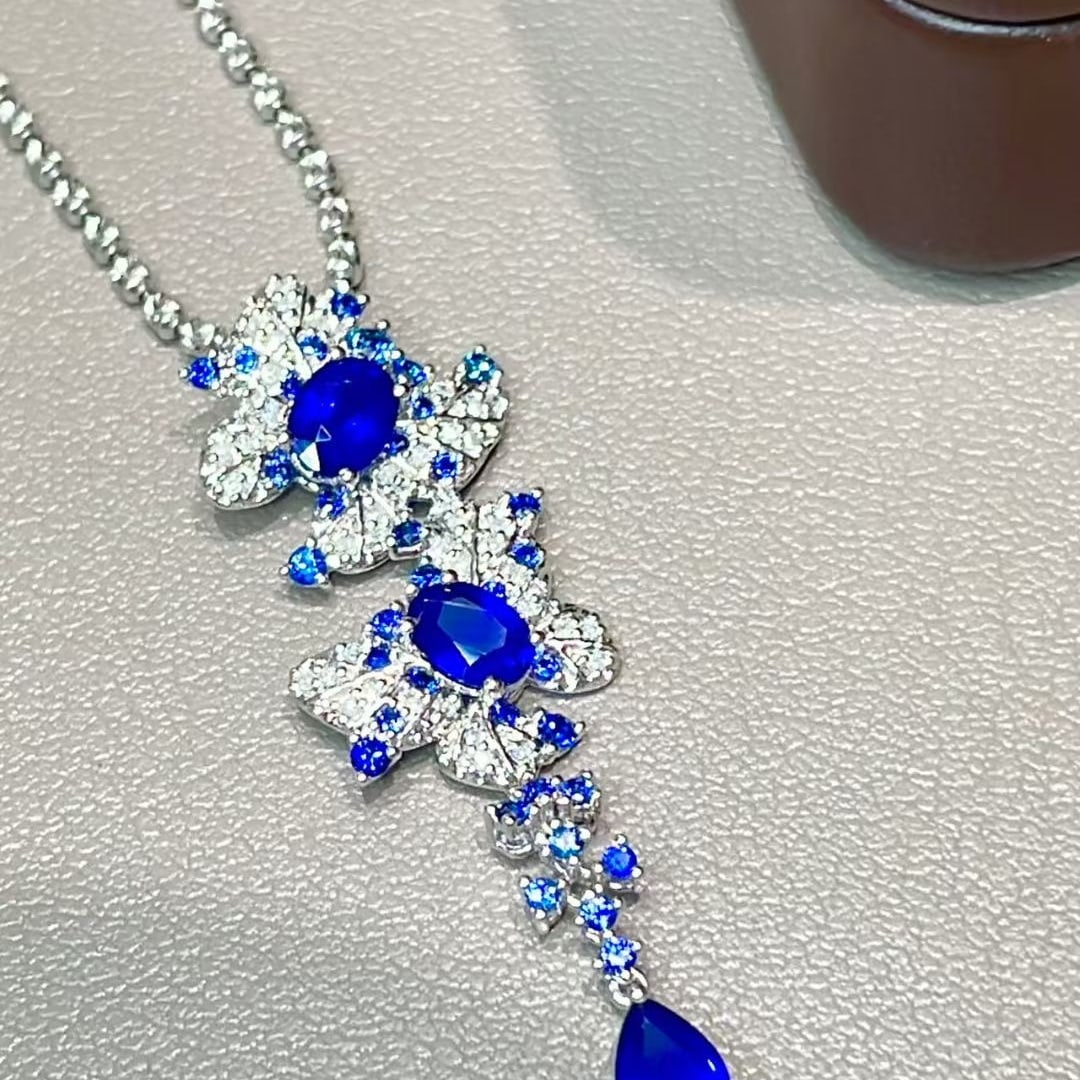 14k Gold 1.3 Ct Natural Sapphire & Diamond Pendant( Without Chain ): Ref:230995094 // gold content:14k gold // main gemstone:sapphire // shape:oval & pear // carat weight:1. 3ct // color:blue // treatment:natural // // adjacent gemstone 2 : diamond // shape:round //