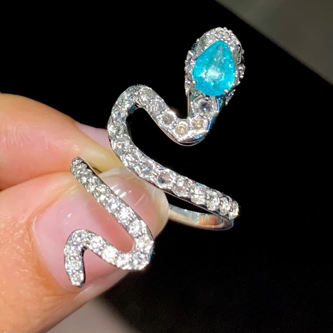 14k Gold 0.55 Ct Natural Paraiba Tourmaline & Diamond Ring: Ref:230995105 // gold content:14k gold // ring size:7. 25us // // main gemstone:paraiba tourmaline // shape:pear // carat weight:0. 55ct // color:neon blue // treatment:natural // // adjacent