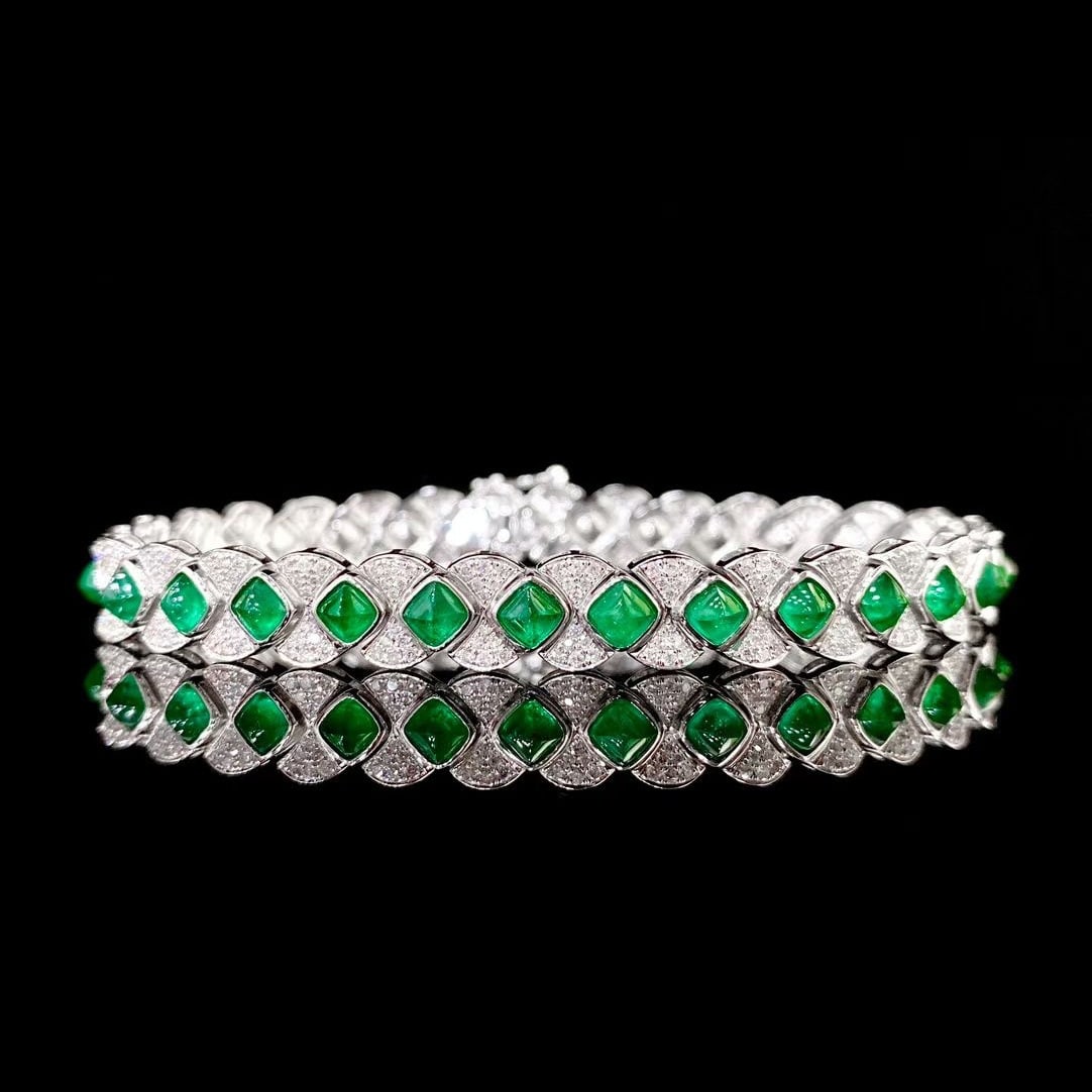 14k Gold 6.17 Ctw Natural Emerald & Diamond Bracelet: Ref:230995106 // gold content:14k gold // main gemstone:emerald // shape:suger-loaf // carat weight:4. 87ct // color:green // treatment:natural // // adjacent gemstone 2 : diamond // shape:round // ca