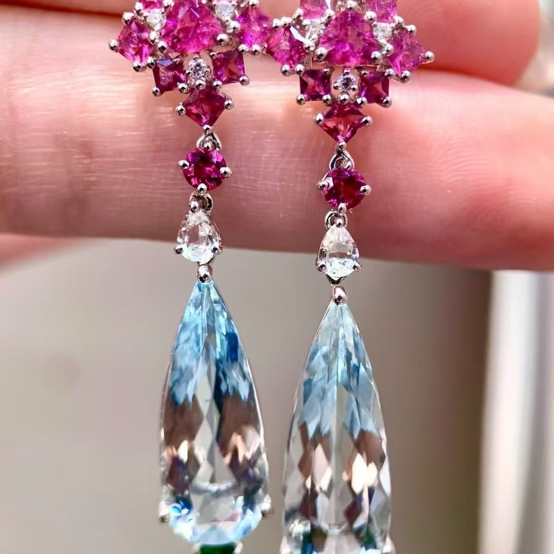 14k Gold 12.15 Ctw Natural Aquamarine & Tourmaline Earrings: Ref:230995115 // gold content:14k gold // main gemstone:aquamarine // shape:pear // carat weight:9. 5ct // color:blue // treatment:natural // // adjacent gemstone 2 : tourmaline // shape:multiply // c