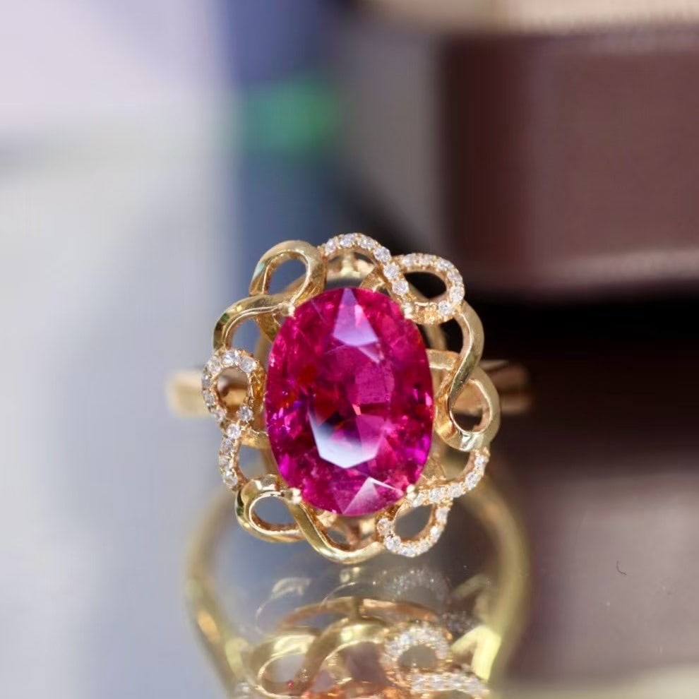 14k Gold 3.03 Ctw Natural Tourmaline & Diamond Ring: Ref:230995124 // gold content:14k gold // ring size:7. 25us // // main gemstone:tourmaline // shape:oval // carat weight:2. 9ct // color:red // treatment:natural // // adjacent gemstone 2 : diamond //