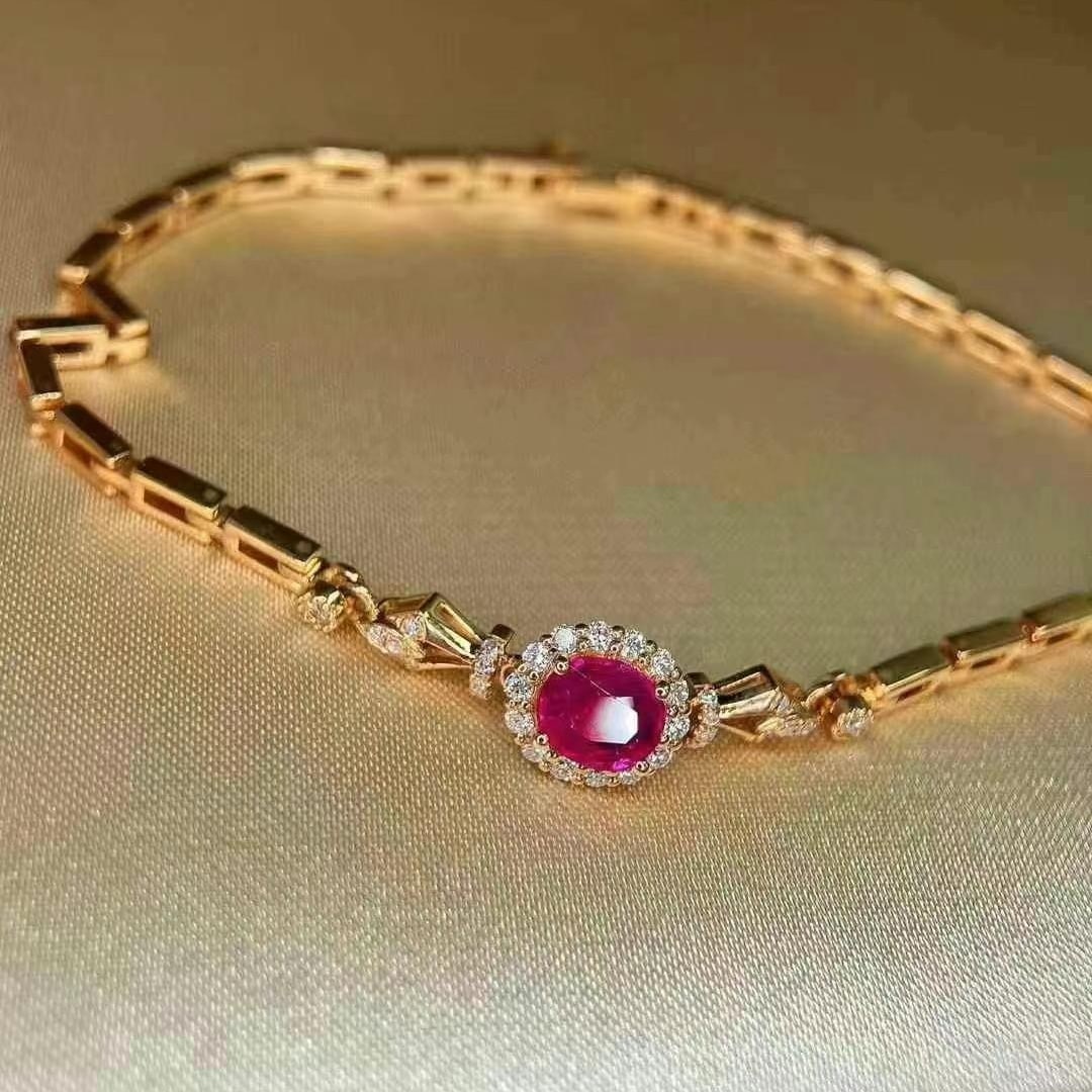 14k Gold 0.72 Ctw Natural Ruby & Diamond Bracelet: Ref:230995131 // gold content:14k gold // main gemstone:ruby // shape:oval // carat weight:0. 5ct // color:red // treatment:natural // // adjacent gemstone 2 : diamond // shape:round // carat