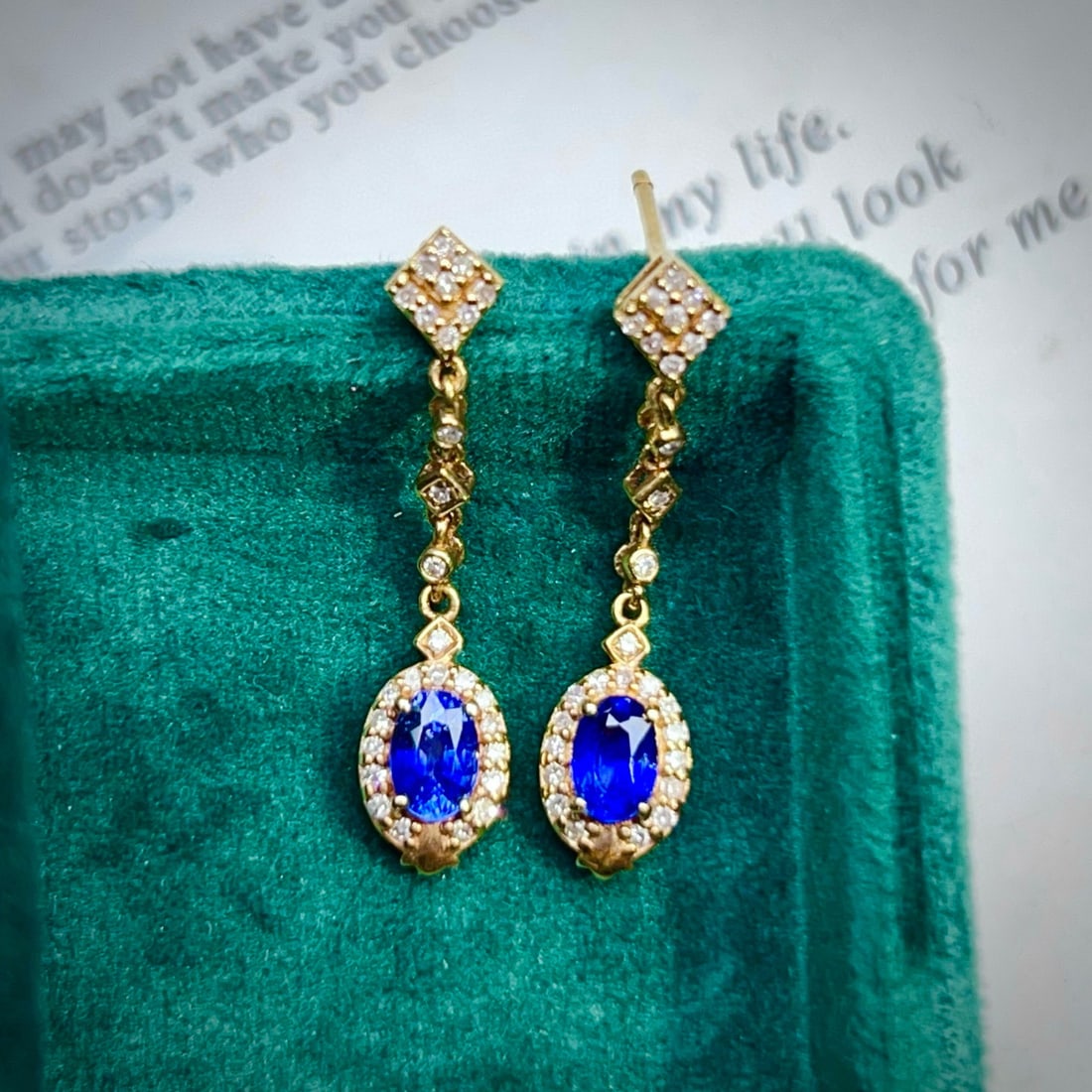14k Gold 1.52 Ctw Natural Sapphire & Diamond Earrings: Ref:230995150 // gold content:14k gold // main gemstone:sapphire // shape:oval // carat weight:1. 25ct // color:blue // treatment:natural // // adjacent gemstone 2 : diamond // number of stones:54 //