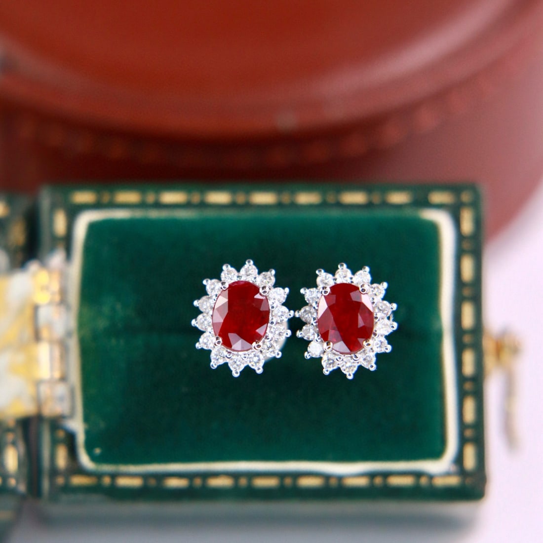 14k Gold 1.06 Ctw Natural Ruby & Diamond Earrings: Ref:230995178 // gold content:14k gold // main gemstone:ruby // shape:oval // carat weight:0. 88ct // color:red // treatment:natural // // adjacent gemstone 2 : diamond // shape:round // carat