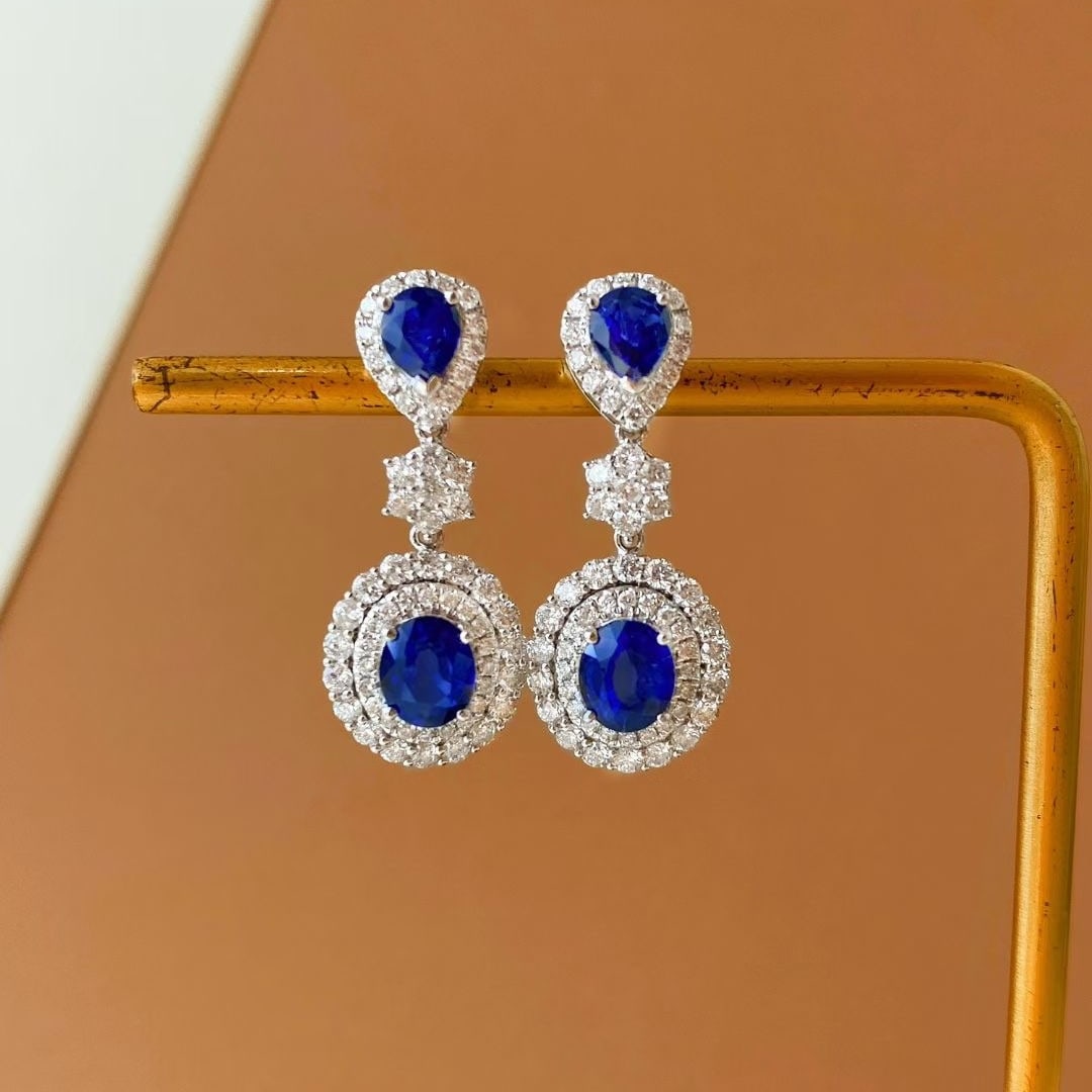 14k Gold 3.91 Ctw Natural Sapphire & Diamond Earrings: Ref:230995203 // gold content:14k gold // main gemstone:sapphire // shape:oval & pear // carat weight:2. 26ct // color:blue // treatment:natural // // adjacent gemstone 2 : diamond // shape:round // c