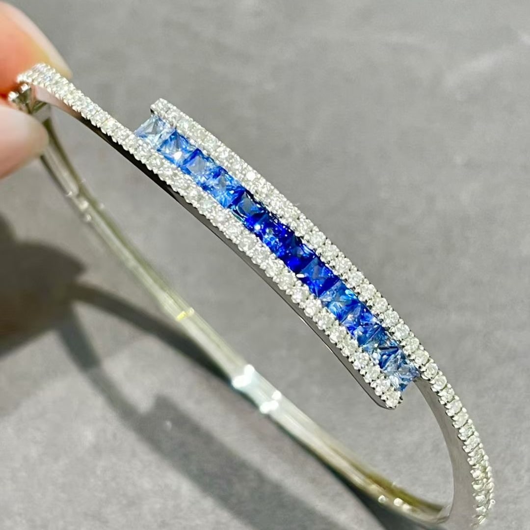 14k Gold 2.25 Ctw Natural Sapphire & Diamond Bangle: Ref:230995218 // gold content:14k gold // main gemstone:sapphire // shape:princess // carat weight:1. 5ct // color:blue // treatment:natural // // adjacent gemstone 2 : diamond // shape:round // carat