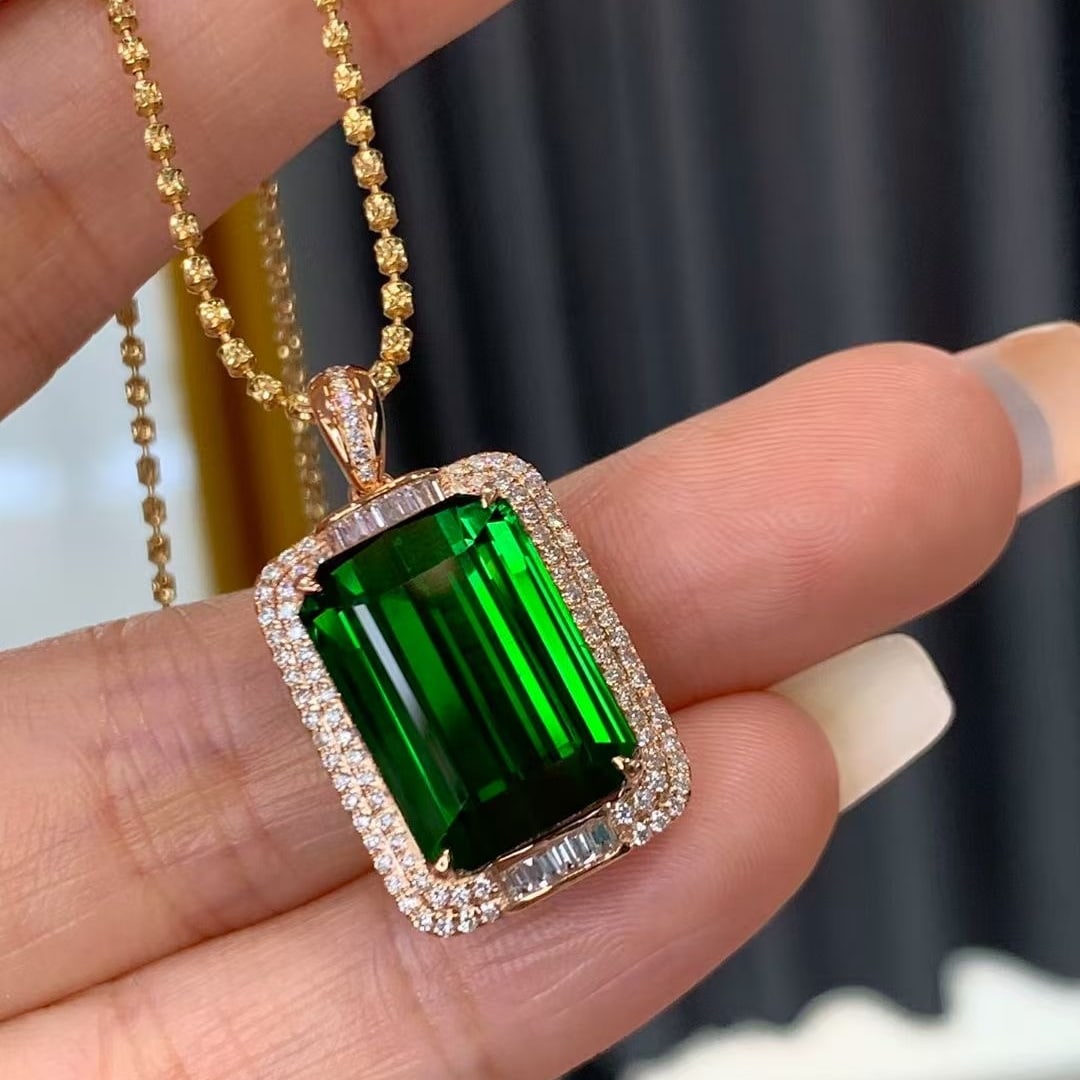 14k Gold 13.33 Ctw Natural Tourmaline & Diamond Pendant( Without Chain ): Ref:230995226 // gold content:14k gold // main gemstone:tourmaline // shape:octagonal // carat weight:12. 84ct // color:green // treatment:natural // // adjacent gemstone 2 : diamond //