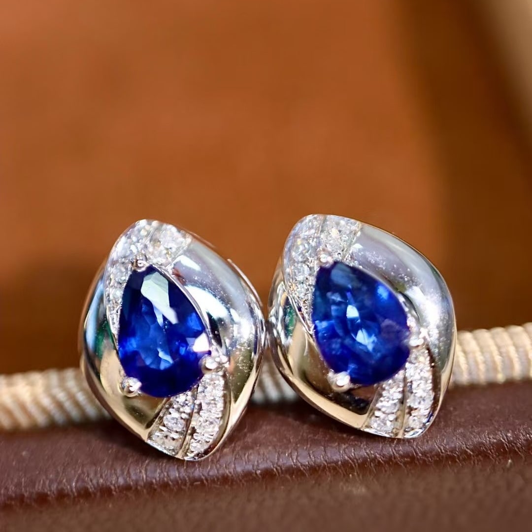 14k Gold 1.33 Ctw Natural Sapphire & Diamond Earrings: Ref:230995242 // gold content:14k gold // main gemstone:sapphire // shape:pear // carat weight:1. 1ct // color:blue // treatment:natural // // adjacent gemstone 2 : diamond // shape:round // carat