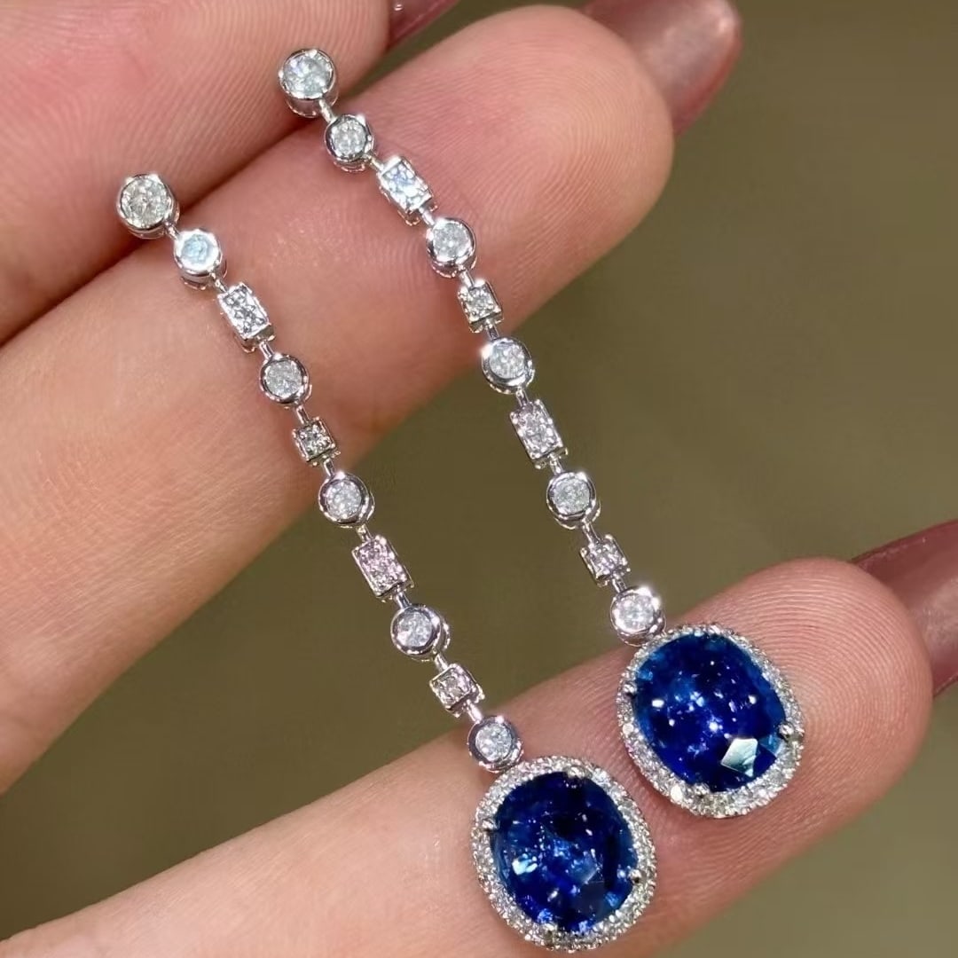 14k Gold 2.8 Ct Natural Sapphire & Diamond Earrings: Ref:230995246 // gold content:14k gold // main gemstone:sapphire // shape:oval // carat weight:2. 8ct // color:blue // treatment:natural // // adjacent gemstone 2 : diamond // shape:round // clarity