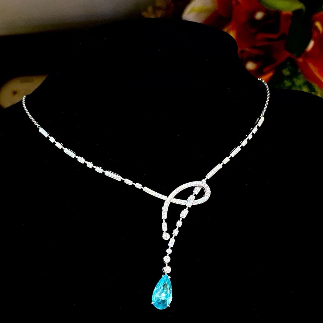 14k Gold 2.62 Ctw Natural Paraiba Tourmaline & Diamond Necklace: Ref:230996046 // gold content:14k gold // main gemstone:paraiba tourmaline // shape:pear // carat weight:2. 07ct // color:neon blue // treatment:natural // // adjacent gemstone 2 : diamond //
