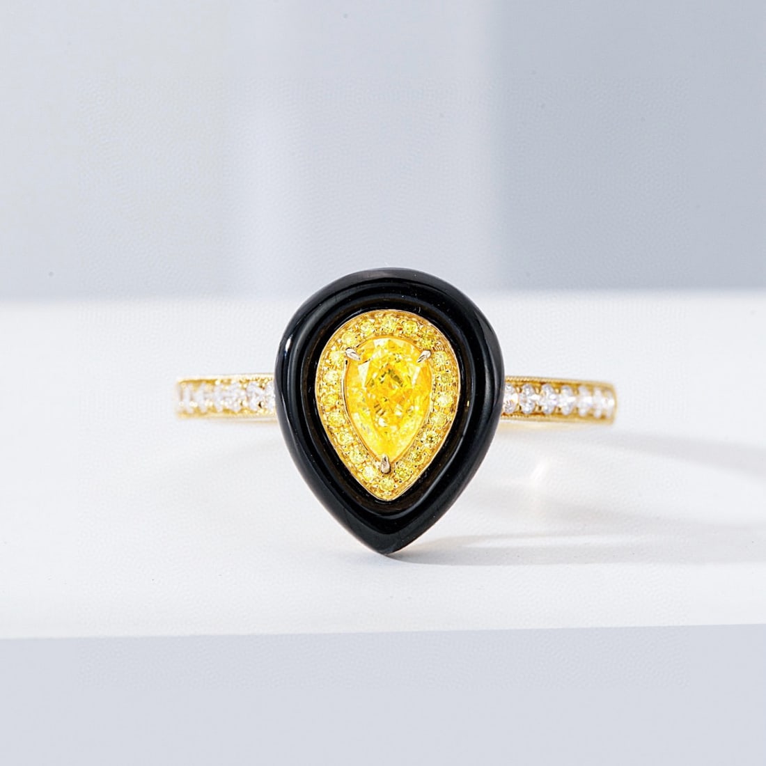 14k Gold 0.47 Ctw Natural Yellow Diamond & Diamond Ring: Ref:230996053 // gold content:14k gold // ring size:7. 25us // // main gemstone:yellow diamond // shape:pear // carat weight:0. 30ct // color:yellow // treatment:natural // // adjacent gemstone 2 :