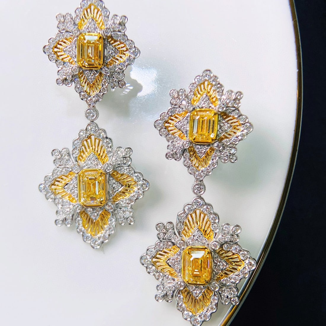 14k Gold 3.70 Ctw Natural Yellow Diamond & Diamond Earrings: Ref:230996054 // gold content:14k gold // main gemstone:yellow diamond // shape:emerald // carat weight:2. 37ct // color:yellow // treatment:natural // // adjacent gemstone 2 : diamond // shape:round 