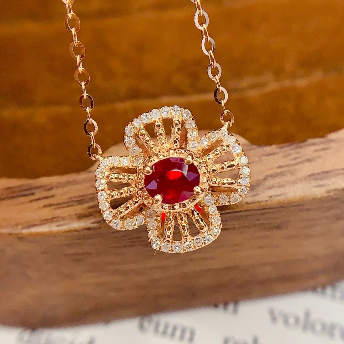 14k Gold 1.78 Ct Vivid Red Natural Ruby & Diamond Necklace: Ref:230996060 // gold content:14k gold // main gemstone:ruby // shape:oval // carat weight:1. 78ct // color:vivid red // treatment:natural // // adjacent gemstone 2 : diamond // number of stones:48