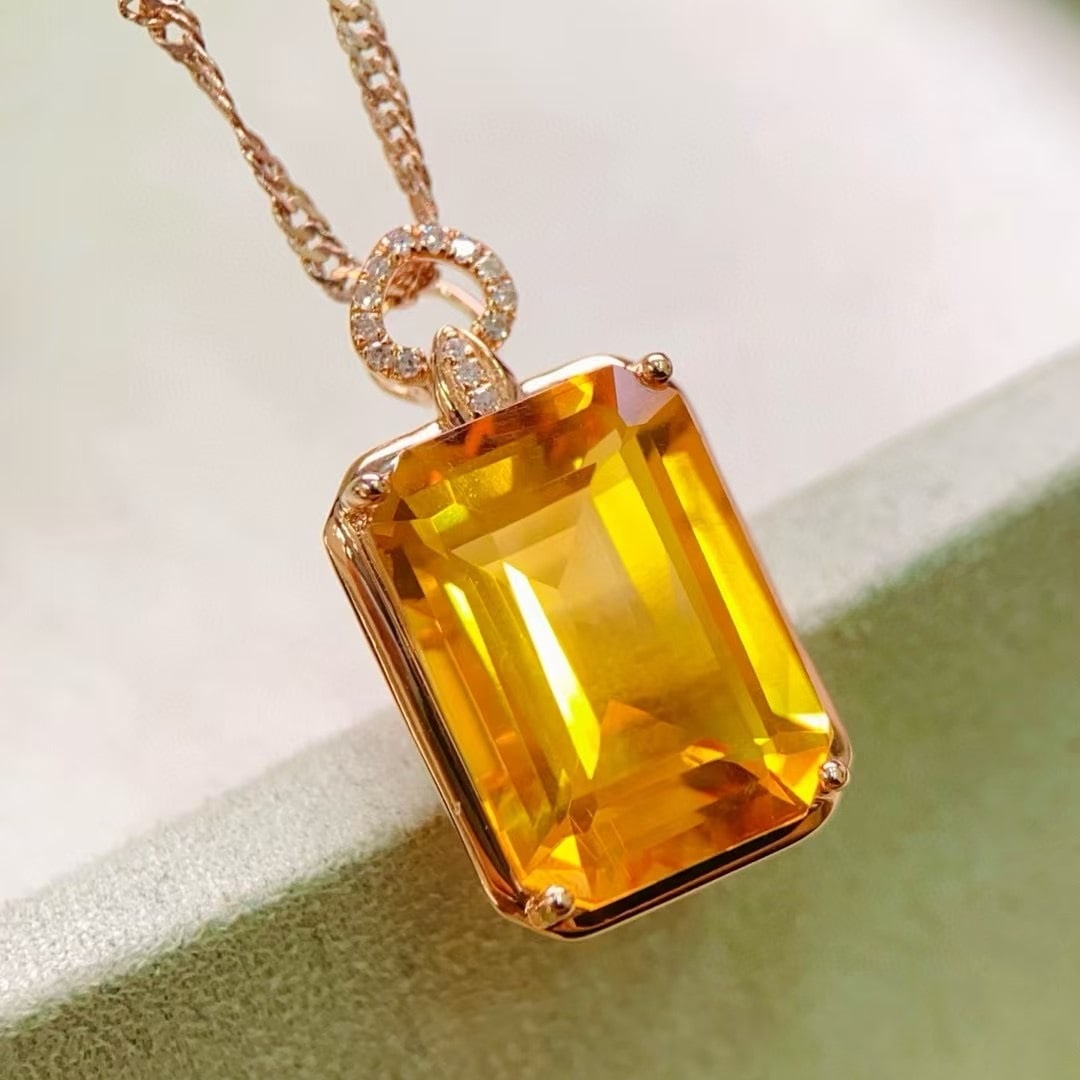 14k Gold 6.64 Ctw Natural Citrine & Diamond Pendant( Without Chain ): Ref:230996136 // gold content:14k gold // main gemstone:citrine // shape:octagonal // carat weight:6. 6ct // color:yellow // treatment:natural // // adjacent gemstone 2 : diamond // number of stones:1