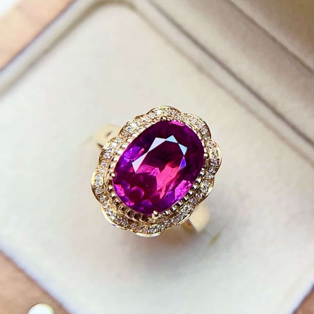 14k Gold 4.9 Ct Natural Tourmaline & Diamond Ring: Ref:230996171 // gold content:14k gold // ring size:7. 25us // // main gemstone:tourmaline // shape:oval // carat weight:4. 9ct // color:purplish red // treatment:natural // // adjacent gemstone 2 : d