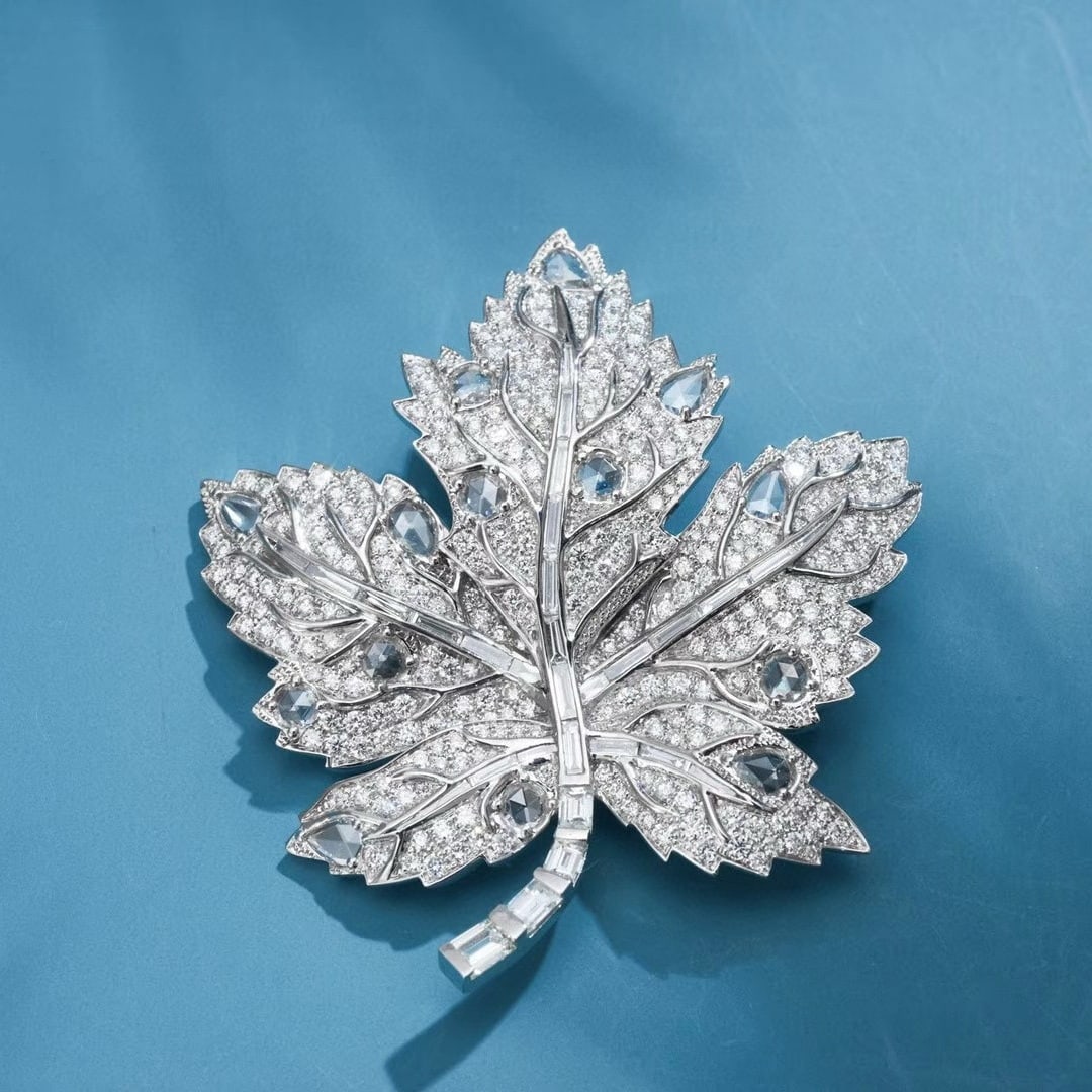 14k Gold 3.56 Ct Natural H Diamond Brooch: Ref:230996199 // gold content:14k gold // main gemstone:diamond // shape:multiply // carat weight:3. 56ct // clarity grade:vs-si // color:h // treatment:natural // Condition: New Low Estimate: 15000.0