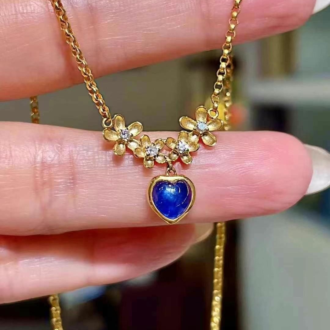 14k Gold 1.28 Ctw Natural Sapphire & Diamond Necklace: Ref:230996218 // gold content:14k gold // main gemstone:sapphire // shape:heart // carat weight:1. 20ct // color:blue // treatment:natural // // adjacent gemstone 2 : diamond // shape:round // carat