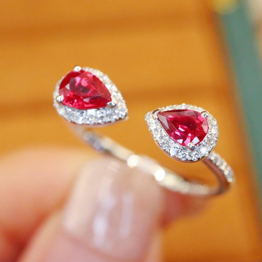 14k Gold 0.69 Ctw Natural Ruby & Diamond Ring: Ref:230996316 // gold content:14k gold // ring size:7. 25us // // main gemstone:ruby // shape:pear // carat weight:0. 55ct // color:red // treatment:natural // // adjacent gemstone 2 : diamond // numb