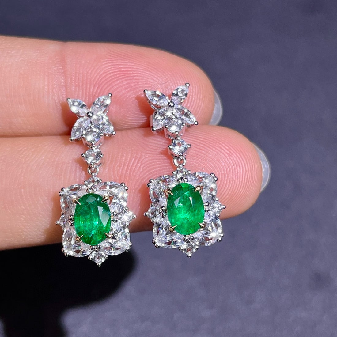 14k Gold 3.93 Ctw Vivid Green Natural Emerald & Diamond Earrings: Ref:230996337 // gold content:14k gold // main gemstone:emerald // shape:oval // carat weight:1. 39ct // color:vivid green // treatment:natural // // adjacent gemstone 2 : diamond // shape:multiply //