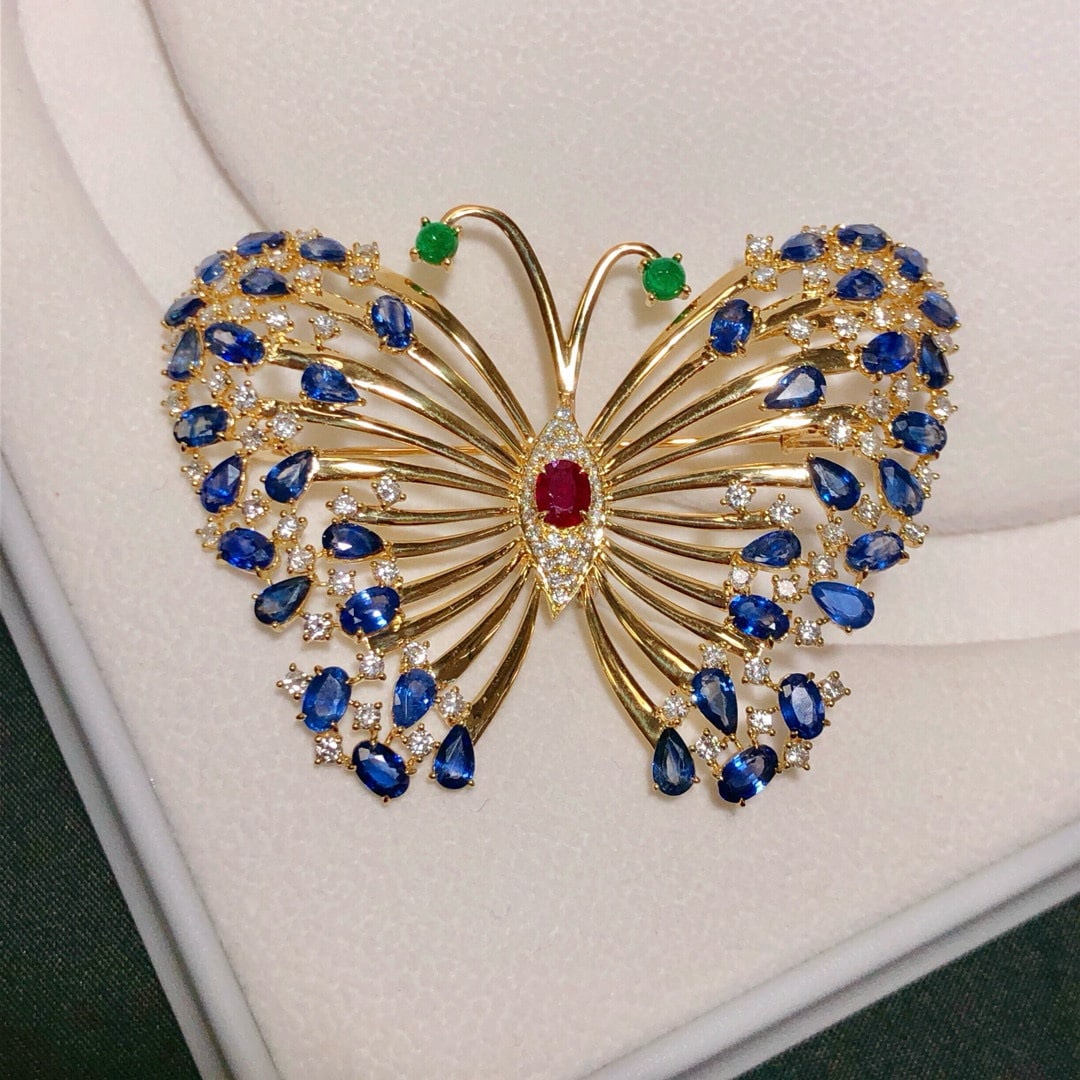 14k Gold 13.50 Ctw Natural Ruby & Sapphire & Butterfly Brooch/pendant( Without Chain ): Ref:230996343 // gold content:14k gold // main gemstone:ruby // shape:oval // carat weight:0. 58ct // color:pigeonblood red // treatment:natural // // adjacent gemstone 2 : sapphire // shape:multiply 