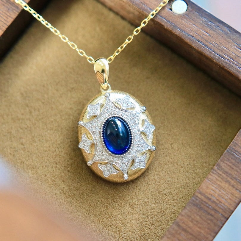 14k Gold 1 Ct Natural Sapphire & Diamond Necklace: Ref:230996363 // gold content:14k gold // main gemstone:sapphire // shape:oval // carat weight:1ct // color:royal blue // treatment:natural // // adjacent gemstone 2 : diamond // shape:round //